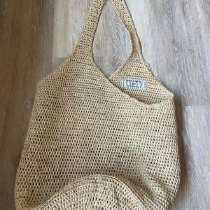 Helen kaminski straw bucket bag